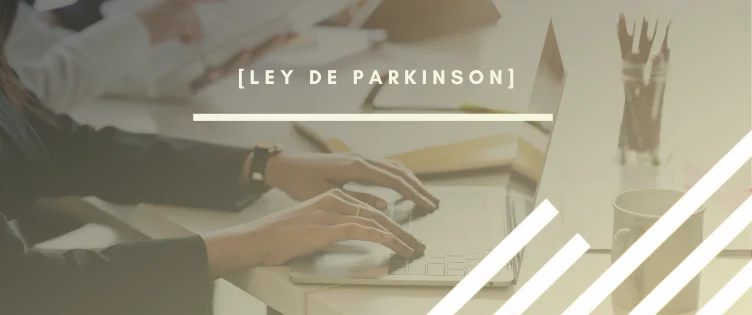 Imagen de portada creativa para el artículo del blog sobre Ley de Parkinson por INTERIM GROUP